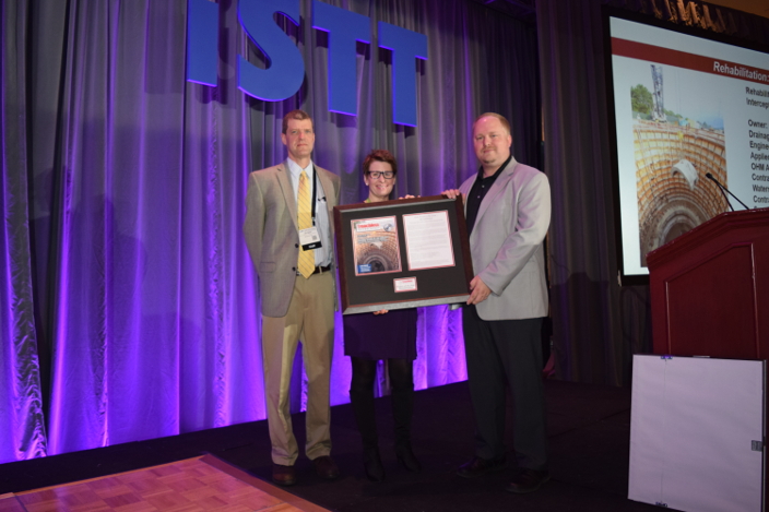 POY-Rehab-Jason Edberg NTH Consultants Trenchless Technology editor Jim Rush, managing editor Sharon Bueno and Jason Edberg with NTH.
