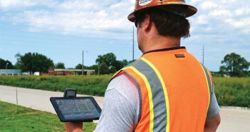 Digital World Comes to Underground Industry construction worker using technology