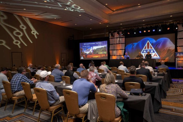 Regular members discuss APCA business during their annual meeting.