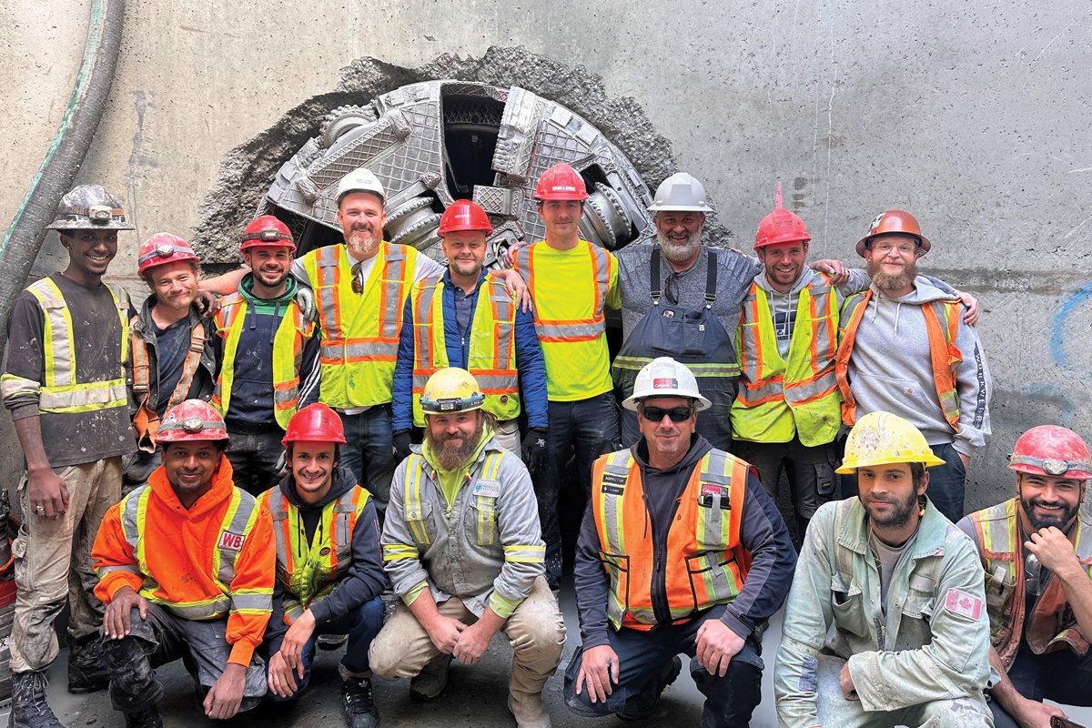 Nose Creek Microtunnelling Team at Hole Through