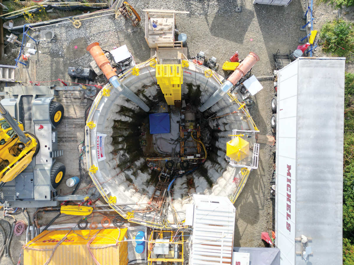 Michels Trenchless Inc. used a microtunnel boring machine (MTBM) to build two parallel tunnels.